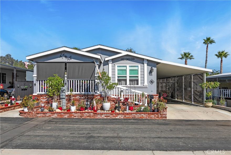 Welcome to 8651 Foothill Blvd #82 — a meticulously maintained and tastefully upgraded home offering style, comfort, and peace of mind. Step inside and immediately notice the attention to detail throughout every space. 2 Bedroom 2 bath with an office that can be turned into a 3 bedroom if needed. 

Enjoy fresh landscaping  with new gravel, new exterior paint, river rock, and elegant pavers leading to your private outdoor retreat. Custom privacy patio shades and a handcrafted wood fence create a serene setting for relaxing or entertaining.

This home comes equipped with four solar-powered Ring cameras, solar flood lights, and custom carport privacy shades for added security and convenience. The exterior is enhanced with Cemplank Lap Siding, Roof Ridge Vents, and dusk-to-dawn lighting for durability and efficiency.

Inside, experience comfort year-round with a Luxaire 4-ton single-stage HVAC system, new Sensi Wi-Fi thermostat, and electric smoke and carbon monoxide detectors with 9V backup.

The kitchen features a Whirlpool 4-piece stainless steel appliance package, upgraded faucets and fixtures, large single-bowl sink, and stylish two-tone cabinetry accented by custom lighting and wood valances. Govee under-cabinet lighting and Hubspace Wi-Fi deadbolt locks on both entry doors add a smart, modern touch.

Other highlights include upgraded light fixtures throughout, custom iron security doors, new Whirlpool washer and dryer, and monthly pest maintenance by Corky’s Pest Control.

This move-in-ready home blends thoughtful upgrades, energy efficiency, and smart-home features — all in a peaceful, well-kept community. Save on your electric bill as the solar panel are paid off.