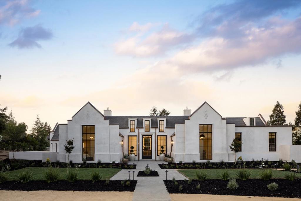 Just completed, this extraordinary Modern French home is on a fully level acre close to the Los Altos Village. Every detail reflects exceptional quality - from hand-finished cabinetry to curated lighting and exquisite materials throughout. Designed for luxury living and entertaining, the home spans two levels connected by elevator, with expansive outdoor spaces on each floor for seamless indoor/outdoor flow and remarkable natural light. The home has 6 bedrooms, 6 full baths, and 2 half baths including main-level primary suite. Also, a 1-bed, 1-bath ADU with full kitchen. There is a stunning great room, designer kitchen with Lacanche range, separate catering kitchen, office or library, tremendous recreation/media room with full bar, fitness center, and golf/sports simulator or movie room. There is a pool and fireplace terrace. Smart home automation, solar power, radiant and HVAC systems plus garage parking for 4 cars. An exceptional offering in a most sought-after location with access to excellent Los Altos schools.
