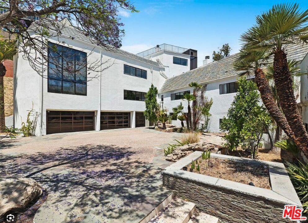 UNPARALLELED DEVELOPMENT OPPORTUNITY PRIME WEST HOLLYWOOD. This is a once-in-a-lifetime chance to reimagine a historic (not protected) estate in one of L.A.'s most coveted locations. Nestled on 2.19 acres in the heart of West Hollywood, this exclusive property comes with world-renowned architect Richard Landry's visionary plans to transform it into a modern masterpiece. Beyond its current condition, this estate offers endless potential from its grandfathered championship-sized tennis court, sprawling motor court, and private gated driveway. To its Massive Views and Amazing privacy! The existing structure boasts breathtaking, unobstructed panoramic views from Downtown to the Pacific, including Catalina. For developers, visionaries, and luxury home builders, this is an opportunity to craft a landmark estate like no other. Act fast as opportunities like this are exceedingly rare!