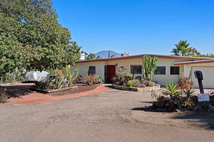 Mid-Century Gem in Mt Helix!  This single level home is situated on a huge and level lot with expansive southern views, great street and paid Solar with a New Roof!  Check out the gated and large side yard, perfect for your pool or private ADU and it has a Transfer Switch ready for a generator with natural gas should power go out.  The property features updated bathrooms, cozy fireplace and an amazing, covered patio to celebrate indoor/outdoor living!  Property also features a renovated full bathroom for easy guest access off the patio area and is prepped for an outdoor shower.  Plenty of parking for your toys, RV's or car collection with a gated entrance as well as plenty of parking on the opposite side of the property.  To top it off, the 2-car garage is oversized, perfect for 2 cars, motorcycle and a sizeable work area.   This is the perfect house that's finally come on the market!