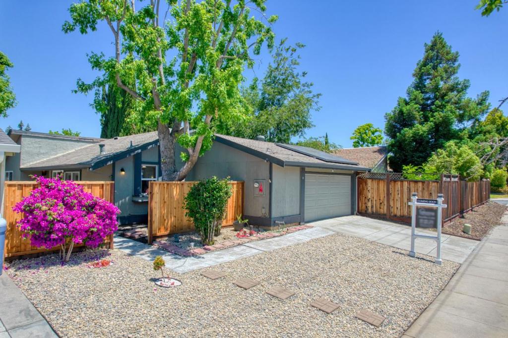 Recently refreshed. Nestled in a vibrant San Jose neighborhood, this beautifully updated 4-bed, 2-bath single-family home offers 1,399 sq ft of comfortable living. This home features numerous modern upgrades including fully owned solar panels and a Powerwall (~7,000 kWh/year), updated indoor/outdoor lighting, custom fabric blinds and blackout curtains, and a dual shower head en-suite in the primary bedroom. The kitchen boasts a large basin sink, induction range, convection/air-fryer oven, garbage disposal, and pull-out cabinet shelves. Enjoy California living with 2 sets of French doors, atrium sliding screens, a handmade garden box, greenhouse, compost bin, fruiting trees, and a lush, drought-tolerant garden and a shed in the backyard. Recent upgrades include a newer fence, water-efficient toilets, and a 2022 Yarna water descaler. Extras like a mounted 69" TV, BBQ grill and outdoor shed are included. Convenient proximity to amenities (Lowes, Target, Costco, Kaiser, VTA, Avenue One) make this home a must-see!