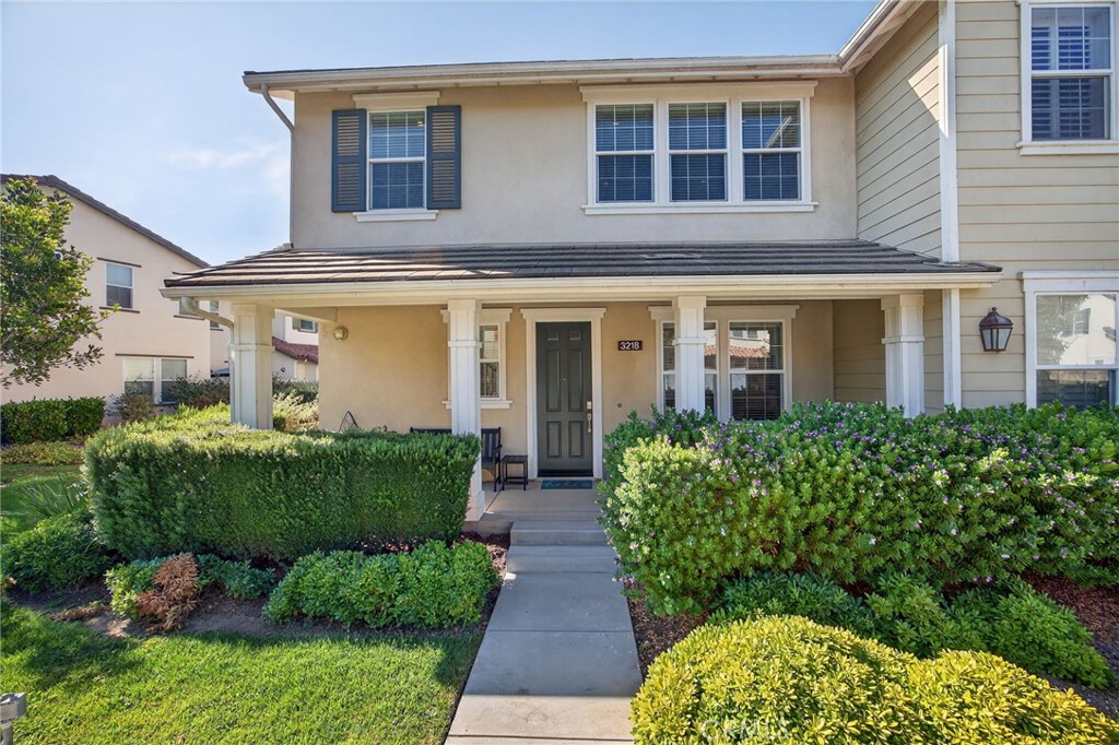 Welcome to 3218 Lisbon Lane in Riverpark, Meridian – a beautifully upgraded townhome blending style, comfort, and functionality. This 1,929 sq. ft. home greets you with a bright open floor plan, 4.5-inch solid wood baseboards, and versatile main-level living that includes a den with a full bath. The gourmet kitchen shines with granite countertops, bar seating, abundant cabinetry, and premium KitchenAid stainless appliances – including a double convection oven, convection microwave, dishwasher, reverse osmosis system, and a 15-bottle wine fridge. The kitchen flows into the dining and living areas, highlighted by custom built-ins featuring a 48-bottle hardwood wine cabinet, Restoration Hardware pulls, Bendheim glass inlays, and a black galaxy granite countertop. Upstairs, the spacious primary suite offers a custom walk-in closet with upgraded drawers and shelving, a dual-sink vanity, and walk-in shower. Two additional bedrooms, a full bath, and laundry with upper cabinets complete the second level. Notable enhancements include matte hickory hardwood floors (2020), Nest smart-home features (thermostat, smoke/CO alarms), Wemo smart switches, and a Schlage smart lock. The home also boasts a Lennox Elite high-efficiency A/C (2020), water softener, and faux wood window coverings throughout. Outdoor living is just as thoughtful, with a private exposed aggregate patio ideal for BBQs, plus a two-car garage equipped with a workbench, pegboard, LED lighting, and overhead storage. Located minutes from The Collection, Whole Foods, restaurants, theaters, and more. This is FHA & VA–approved. In Riverpark, you’re not just buying a home, you’re buying a lifestyle.