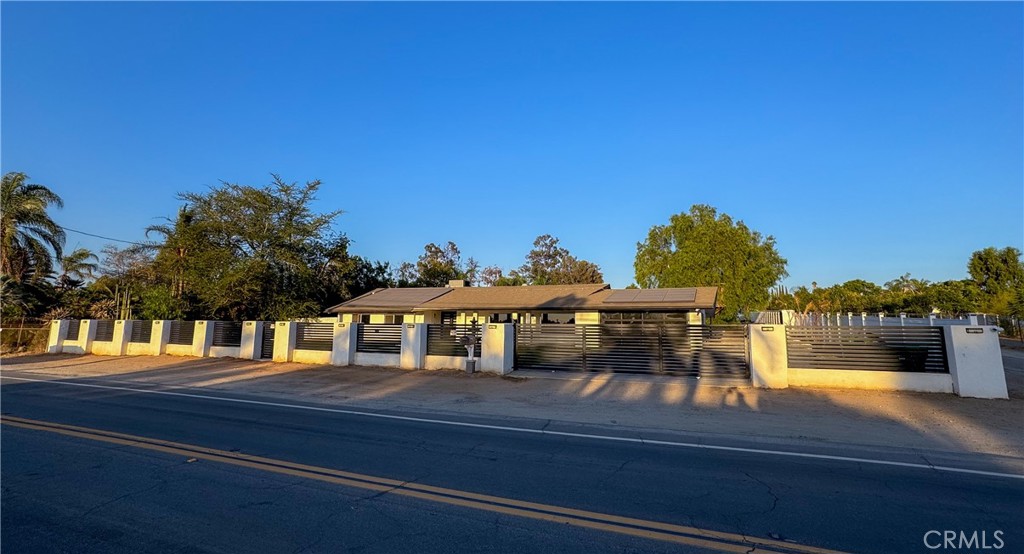 Welcome to this prestigious Horse property neighborhood, featuring horse trails and a spacious driveway with a 2-car garage. An electronically secured gate leads large landscaped front yard and stamped concrete driveway. Inside, you'll find a beautiful spacious living room . The kitchen area includes a breakfast nook and the family room has large windows and an amazing French door offering beautiful views of pool and huge backyard and Horse stalls 4 spacious bedrooms. The master bedroom includes a spacious closet and lighting fixtures. This home is settled on a acre lot with a backyard oasis featuring a built-in island BBQ, and a saltwater pool and spa Horse stalls And house trails This home is close to excellent schools, supermarkets, and local wineries. All of this with no Mello-roos or HOAs fees. Make this your new home today