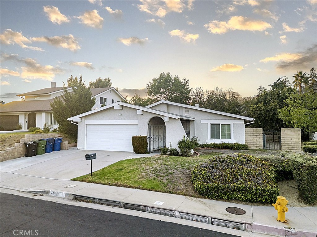 Welcome to 11685 Amigo Avenue, a beautifully maintained single family home situated on a 7911 square foot corner lot in the heart of Porter Ranch. This 3 bedroom, 2 bathroom residence offers 1418 square feet of inviting living space, designed for comfort and easy entertaining.
Inside, you will find a warm and welcoming living area with a classic brick fireplace, ideal for cozy evenings. The open concept kitchen features ample counter space and a breakfast bar, perfect for casual dining or morning coffee. Additional highlights include abundant closet space, ceiling fans throughout, natural light in every room, and a Nest thermostat for modern convenience.
The attached 2 car garage provides both parking and storage, while the backyard offers plenty of space for gatherings, barbecues, or quiet relaxation. Situated on a large corner lot, the home enjoys added privacy and curb appeal.
Located near top rated schools, parks, shopping, and dining, this home offers both comfort and convenience. Pets are welcome, making it a wonderful opportunity to enjoy all that Porter Ranch living has to offer.