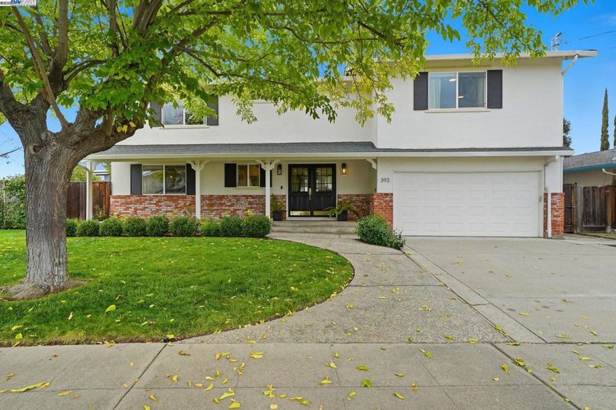 Welcome to 393 Lloyd Street in Livermore! This beautiful home offers an inviting blend of comfort and luxury with its five spacious bedrooms and four well-appointed bathrooms. Spanning 2,561 square feet on a generous 8,338 square foot lot, this property is perfect for those who appreciate space.  Step inside and be greeted by a lovely open floor plan, ideal for entertaining and family gatherings. The home boasts two primary bedrooms upstairs, each with its own en suite bath, providing a serene retreat. An added bonus is the utility/workout room upstairs, which leads to a private deck—perfect for enjoying fresh air post-workout.  The backyard is a true retreat, boasting a saltwater pool and trampoline for fun-filled days. A private office in the backyard offers a quiet workspace away from the main household activities. The downstairs laundry room is equipped with a convenient shower, with direct access to the pool area for easy rinsing after a swim. Enjoy outdoor gatherings under the covered patio, and take advantage of the whole house vacuum system for effortless cleaning.   Located in close proximity to Livermore's vibrant downtown, enjoy easy access to shopping, dining, and more. Discover the perfect blend of functionality and leisure in this charming home!