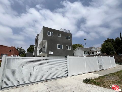 Photo of 1337 S Hudson Avenue, Los Angeles, CA 90019 (MLS # 25619511)