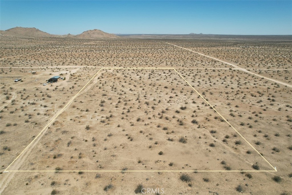 Endless potential on 5 acres of residential land in the peaceful outskirts of Adelanto! Situated off Pineridge Rd with dirt road access, this spacious rural lot offers privacy and freedom—perfect for anyone looking to build a custom home, create an off-grid retreat, or invest in raw land. With no utilities currently on site, it's an ideal blank canvas for those seeking a self-sufficient lifestyle or long-term development opportunity. Explore the possibilities and make your mark in San Bernardino County.