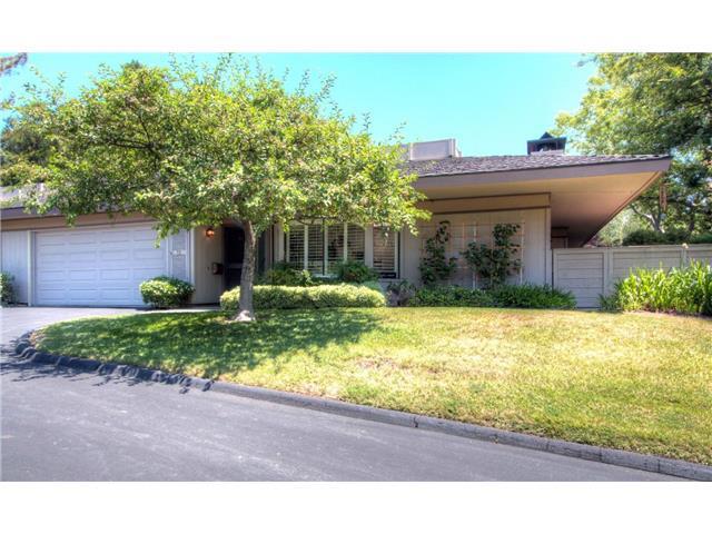 Wonderful updated Creekside Oaks Corner Unit. Ideal location in complex surrounded by 19 + acres of manicured grounds. Single level with new Anderson Windows and sliding doors thru-out. Beautifully redone guest bath, kitchen w/ new counters & brand new appliances, master bath and guest bedroom adjoining den with an additional office area overlooking sunlit atrium. Master bedroom w/sliding doors opening onto stone patio and hot-tub. Minutes to downtown Los Altos and major commute routes. New carpet and flooring throughout.
