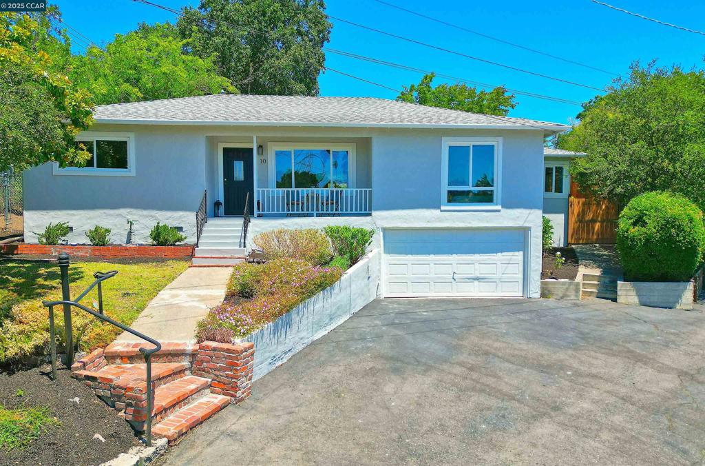 Move right in-to this delightful Lafayette home, perfectly situated at the end of a peaceful cul-de-sac in the highly rated Lafayette/Acalanes School District. The convenient floor plan features 4 bedrooms, including a spacious primary suite with a walk-in closet and serene hillside views. Multiple living spaces include a comfortable living room, bonus family room, and a cozy office nook—ideal for today’s lifestyle. The eat-in kitchen and separate dining area provide great options for casual meals and entertaining. Additional highlights include hardwood floors, a newer HVAC system and roof, and a tankless water heater. Relax on the inviting front porch with scenic hillside views or enjoy the private backyard, complete with a workshop at the top of the yard. Quiet and secluded, yet offering easy access to freeways, BART, downtown, and nearby trails.