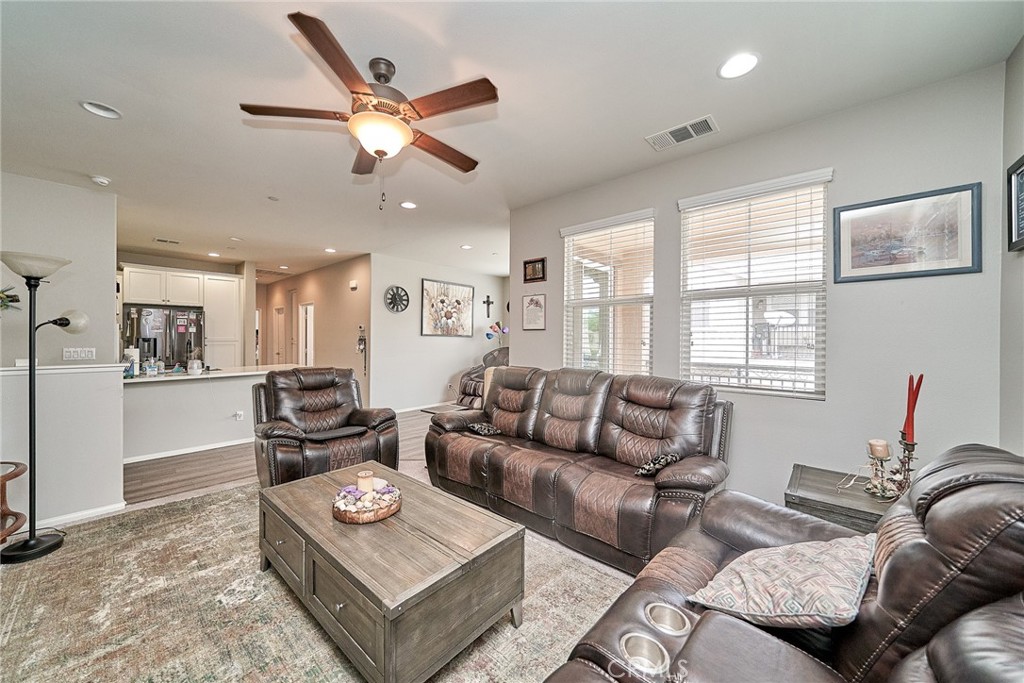 Gorgeous upgraded end-unit condo in the gated Providence community of North Fontana, built in 2016 by D.R. Horton. This home features 2 bedrooms, 2 full bathrooms, an open-concept floor plan, and a convenient in-unit laundry closet. A cozy covered balcony provides beautiful mountain views, while large windows fill the home with abundant natural light.
Upgrades include luxury quartz countertops with matching backsplash, white cabinetry, stainless steel appliances, laminate flooring, recessed lighting, and soaring ceilings. Additional highlights are a newer tankless water heater and an Acorn stairlift, ideal for accessibility or carrying groceries with ease. The attached 2-car garage offers direct access and an additional storage nook.
The Providence community offers resort-style amenities including a clubhouse, pool, spa, covered picnic area, BBQ stations, restrooms, and shower facilities. Residents also enjoy a tot lot, secured mailbox station, ample guest parking, manicured green spaces, and lighted walking paths with dog stations.
Perfectly situated near top-rated schools, Victoria Gardens, Costco, shopping, dining, fitness centers, parks, golf courses, and with easy access to the 210 and 15 freeways.