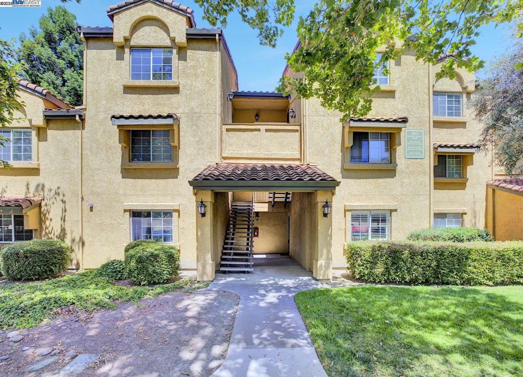 GREAT OPPORTUNITY- Seller is offering a credit for rate buy down on buyer's loan! Discover serene living in this top-floor unit, offering stunning mountain views from your private balcony. The open living space is beautifully illuminated by double sliding doors, allowing an abundance of natural light. Enjoy the convenience of an in-unit laundry room equipped with a washer and dryer, along with generous storage space. The spacious bedroom features high ceilings, wide mirrored closets and the added privacy of no shared walls with the neighbors. Additional highlights include modern fixtures, elegant crown molding, and a NEW installed HVAC system. Located at the community's edge, this unit provides peaceful surroundings, breathtaking views, and ample guest parking. Benefit from community amenities such as a pool, spa, gym, and security gate, all nestled within a lively neighborhood near shopping and dining venues. HOA also covers roof, water and trash. Don't miss out on this opportunity, it is perfect for homeownership or investment.