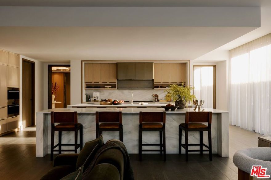 The unveiling of one of the most highly anticipated and uniquely crafted offerings normally unseen in Los Angeles is finally here, after many years of meticulous planning, masterful design, and precise execution: Presenting Rosewood Residences Beverly Hills, a boutique collection of 17 singular luxury homes in an irreplaceable location amidst landmark hotels, internationally acclaimed dining, and the best shopping in the world. Designed in timeless style by critically celebrated Thomas Juul-Hansen, these exceptionally large residences offer unprecedented privacy and generosity of space; an experience enriched by the meticulous, personable service for which Rosewood is renowned. An elevator leads directly from the garage and into an impressive foyer for receiving guests. Floor-to-ceiling windows welcome natural light into the interior spaces. A secondary service elevator opens into a back-of-house service room with lock-off for culinary preparation, laundry, and deliveries. The kitchen, featuring custom millwork designed by Thomas Juul-Hansen and crafted in Milan by Molteni&C, includes two oversized waterfall islands and state-of-the-art Sub-Zero and Wolf appliances. World-class amenities include a shared rooftop with a 50-foot pool, spa, Technogym, bar, kitchen and dining for entertaining, living room, barbecue, cabanas, and spectacular vistas of surrounding treetops, high-rises, and mountains beyond. Those who live at Rosewood Residences Beverly Hills gain access to the rarefied world of Rosewood, whose collection of preeminent hotels and residences includes The Carlyle in New York, Hotel de Crillon in Paris and Las Ventanas al Paraiso in Cabo San Lucas, Mexico. Rosewood is defined by its impeccable and personal approach to service: Associates get to know each resident as an individual, to best cater to their needs and create everyday moments of magic, and Rosewood Residences Beverly Hills is no exception. A full-time concierge and staff of Rosewood-trained professionals includes a dedicated Director of Residences, tasked with curating a life well lived and a high-touch experience unlike any other. At last, a new bar is raised, and the luxury condo market in Los Angeles is forever transformed.