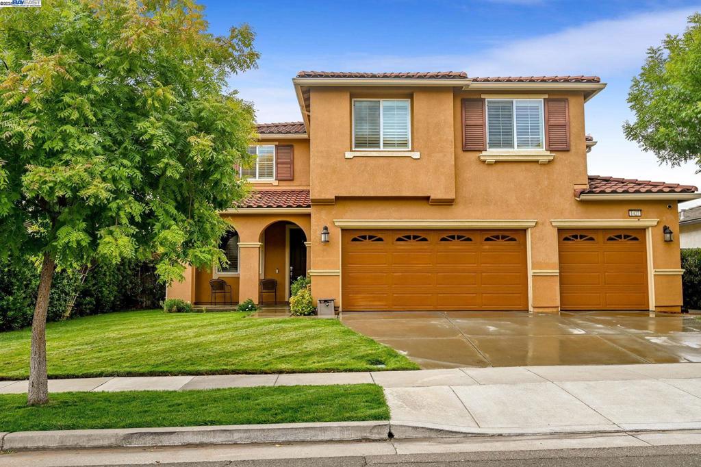 Stunning, high-upgrade single-family home with luxury finishes. This immaculate 5-beds, 3-bath residence spans ~3,477 sq ft and includes an attached 3-car garage. A full bedroom and bath on the 1st floor adds versatility for guests, a home office, or multi-generational living. A large loft on the 2nd floor provides additional flexible living space for gathering, a home gym or quiet retreat. The 1st floor features pristine hardwoods, while the 2nd floor has plush upgraded carpeting. All bathrooms boast stylish tile flooring, adding durability and a polished, cohesive look throughout the home. The chef-inspired kitchen shines with stainless steel appliances, abundant upgraded cabinets, granite countertops and backsplash, island, pantry, double ovens, a new gas stove, and a refreshed faucet. Laundry with washer/dryer, sink, and built-in cabinets enhances convenience. The spacious primary suite offers a spa-like bath with dual vanities, a separate tub and shower, and a large walk-in closet. Step outside to a beautifully landscaped backyard with manicured lawns, pavers, and no rear neighbors for privacy. Upgraded solar power and no HOA dues add energy efficiency and ease of ownership. This turnkey home blends luxury, functionality, and value, ready for you to move in and enjoy.