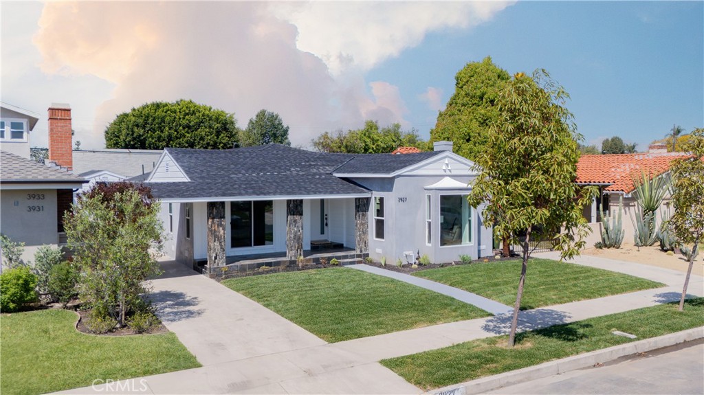 Seller May Contribute toward a rate buy-down or buyer’s closing cost. Welcome to 3927 Welland Ave — a meticulously rebuilt and stylishly redesigned residence located in one of Los Angeles’ most desirable neighborhoods. This stunning home offers 3 spacious bedrooms, including two luxurious en-suites, plus a dedicated office/flex room that’s perfect for working from home or guest use.
As soon as you step inside, you're greeted by a bright, open-concept layout that flows seamlessly from the living area to the designer kitchen — perfect for entertaining or everyday comfort. The kitchen is a true showstopper with all-new custom cabinetry, stainless steel appliances, and sleek modern finishes.
Taken down to the studs and rebuilt with brand new plumbing, electrical, roofing, insulation, drywall, paint, and stucco, this home offers the peace of mind of new construction with the warmth of timeless design. Every bathroom has been thoughtfully finished with designer tile and high-end fixtures, creating a spa-like experience at home.
Enjoy Southern California living year-round with new landscaping, fresh sod, and a private balcony space ideal for relaxing or hosting. This property is truly turnkey — no detail was overlooked.
Located in a high-demand pocket of Los Angeles, you're close to top amenities, freeways, and city hotspots, while still tucked away on a quiet street.
Don’t miss your chance to own a fully rebuilt home that blends quality, style, and location — all at an incredible value.