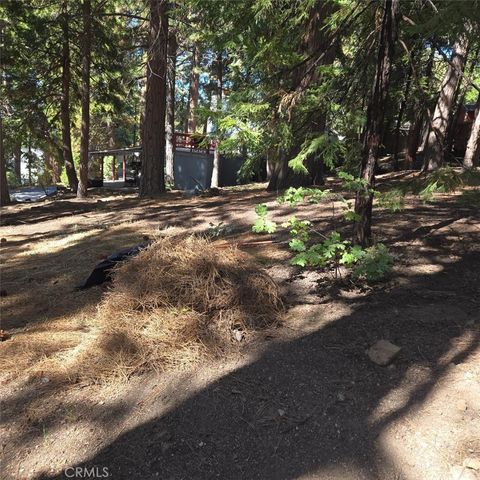 Photo of 31492 Inspiration Dr, Running Springs, CA 92382 (MLS # IV26033866)