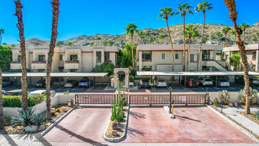 This light-filled, single-level condominium in the beautifully maintained community of Summerset Springs is the perfect blend of cheerful sophistication and pristine design. The moment the owners stepped inside, they knew they had found something special, and they set out to make it spectacular. From the joyful views of the sparkling community pool from the living room, to the vibrant ambiance of every updated detail, this home simply shines. You'll love the rich ivory and chestnut cabinetry, elegant opaline quartz slab countertops, pearl-tile backsplash, and sleek stainless steel appliances, all tied together with handpicked lighting that adds a chic, curated glow to every corner. The versatile third bedroom makes a perfect den or office. The layout flows beautifully, featuring three sliding doors that lead to sunny patios, ideal for lounging, entertaining, or simply sipping a beverage of your choice. The primary suite is a private retreat, complete with dual closets, direct patio access, and its own sparkling en-suite bath featuring a walk-in shower & shower over tub. Additional highlights include a stylish washer/dryer nook, an elegant guest bath, and easy guest parking. Enjoy two community pools, a clubhouse, BBQ area, and nearby access to trails, plus you're within walking distance to Rimrock Shopping Center, Vons, Trader Joe's, Starbucks, and some of Palm Springs' favorite restaurants. It's fun. It's fabulous. It's impeccably maintained and absolutely South Palm Springs-perfect. Come see why this happy hideaway won't last long!