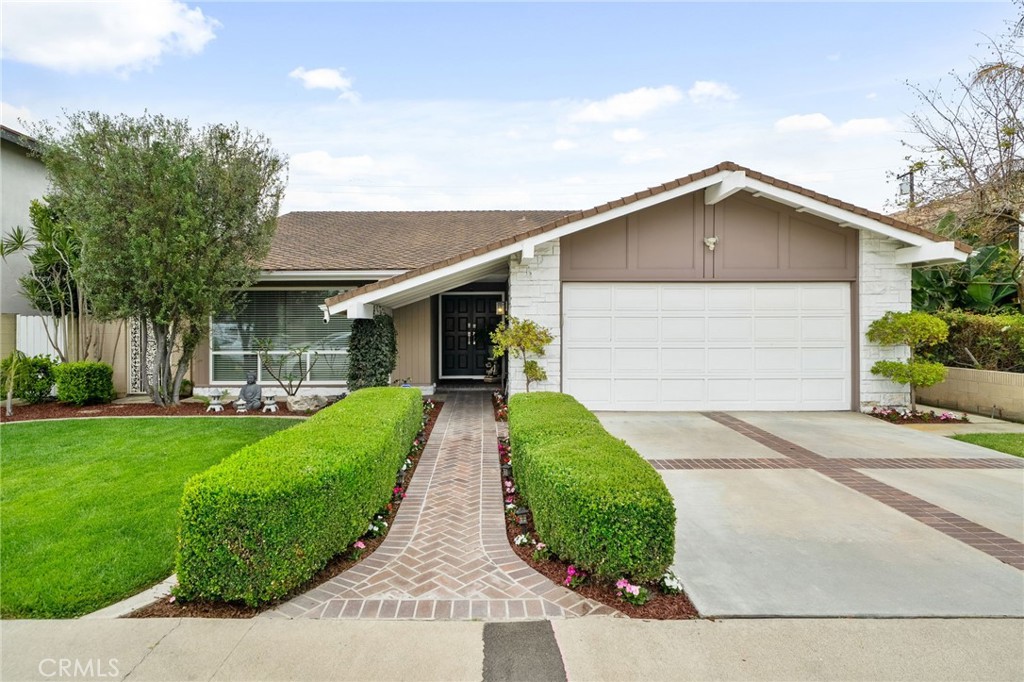 Absolutely Lovely Single Story Home! Offering 4 bedrooms and 2 full bathrooms. The Family/Living Room enjoys a cozy fireplace and opens to the kitchen towards the backyard access. Ample closet spaces and En-suite bathrooms with Walk-In Shower. Close proximity to Disneyland, Anaheim Convention Center, Churches, Schools, Restaurants, Parks and Shopping Centers, making it ideal for families and students. Solar is paid off. No HOA and Mello Roos. Sold As Is. This home is a MUST See!