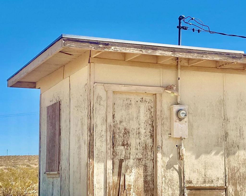 Mid-century cabin with working power connected and paid water meter! 5 acres perched on a gentle slope. Inspiring vistas of Indian Cove, Mt. San Gorgonio w/ snow caps, the Little San Bernardino Mtns, and Copper Mt. 20 acres of open space BLM land to the east. Several vacant lots to the south and the east gives this cabin the ultimate private setting. The county may allow for building two homes and guest homes. Ideal for an architectural designer compound. Starry nights. Bring your horses and animals. 9 miles to the Indian Cove campground. 49 miles to Palm Springs. 142 miles to downtown Los Angeles. About 3 million tourists visit the Joshua Tree National Monument annually. Hot vacation area. The Desert Heights neighborhood is seeing more musicians, artists and celebrities than ever before. New modern homes are popping up in the area. Short drive to organic restaurants, cafes, bars, boutiques and the farmers market. So many nature trails and secret canyons in the greater area for endless adventures. Perfect getaway location. This is a homestead cabin please call the county of San Bernardino planning dept for all questions on this type of zoning and its uses. APN: 0633-122-19-0000 Verify all utilities with the utilities agencies. Cash buyers only. Buyer to verify all info with the County. Don't Wait - Call Now!