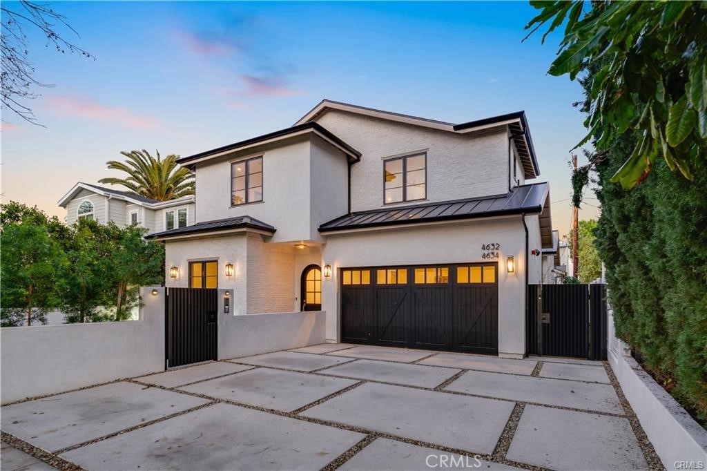 Discover the perfect blend of modern luxury and timeless elegance in this stunning, eco-conscious new construction home and detached ADU, located on a peaceful, tree-lined street in the heart of Sherman Oaks. Thoughtfully designed, this Mediterranean-inspired retreat is the ultimate expression of sophisticated California living. Step through the gated front yard and custom-milled arched entry into a grand foyer adorned with herringbone wood flooring. From the start, you’re met with elevated design featuring designer wallpaper, rich stain-grade wood ceiling beams, and a staircase highlighted by luxurious Roman clay walls. The striking façade, with its mix of classic brick and smooth stucco, sets a refined tone. Inside, the open-concept layout seamlessly connects the formal dining room and expansive family room, complete with ambient lighting and a warm fireplace. Floor-to-ceiling multi-panel sliding doors open to an entertainer’s dream backyard, offering effortless indoor-outdoor flow. At the heart of the home lies a chef’s dream kitchen featuring dual marble islands, top-of-the-line Thermador and Fisher & Paykel appliances, and custom rift-white oak cabinetry. Every bedroom is ensuite and generously sized, including a convenient main-floor suite. Each is finished with elegant white oak flooring and high-end marble accents. The primary suite is a true sanctuary, boasting a wood-clad cathedral ceiling, private balcony, oversized walk-in closet, and a spa-inspired bath with rift oak cabinetry and ambient lighting. Adding even more value, a detached 527 sq. ft. ADU includes its own bedroom and bathroom, soaring ceilings, induction range, and full Bosch appliances — ideal for guests, rental income, or a home studio. The beautifully landscaped backyard is made for relaxation and entertaining with a brand-new pool featuring a spa and baja shelf, a built-in BBQ area, turf lawn, drip irrigation, and privacy-enhancing podocarpus trees. A fully paid-off solar panel system further enhances the home, significantly reducing your electric bill and providing long-term energy savings. Just minutes from Ventura Blvd.’s top dining and shopping, this is a home that delivers on every level — design, comfort, and location.
Flexible rental period available.