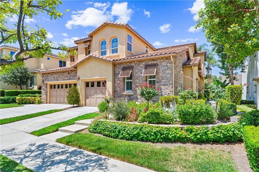 Refined Single-Level Living in Trilogy at Glen Ivy

Welcome to an exceptional opportunity in the coveted 55+ enclave of Trilogy at Glen Ivy, where timeless elegance meets resort-style living. Nestled at the base of the Cleveland National Forest and surrounded by the lush fairways of the Glen Ivy Golf Course, this rare San Juan model offers a seamless blend of natural serenity and sophisticated design.

Located on the ground level with no interior steps, this thoughtfully designed San Juan model features two bedrooms, two full baths, and a flexible den—ideal as a private study, media lounge, or elegant guest quarters. From the moment you enter through the dramatic rotunda foyer, you'll be drawn into a space that is both welcoming and architecturally distinct.

The open-concept layout offers an effortless flow between the great room, dining area, and gourmet kitchen—perfect for hosting or relaxing in style. Designer finishes throughout the home are warm, refined, and inviting, setting a tone of casual luxury and comfort. Large windows frame serene views of the meadow and distant hills, creating a tranquil, ever-changing natural backdrop.

The primary suite is a true retreat, complete with a coffered ceiling, spa-inspired walk-in shower, and a generously sized dressing room-style closet. Tucked away from the main living areas, it offers a quiet sanctuary with a boutique hotel feel.

Outside, the expansive covered patio provides the perfect extension of the living space—ideal for morning coffee, evening cocktails, or intimate dinners beneath the stars. The tandem garage adds versatility, offering space for two vehicles or a combination of car, golf cart, and additional storage.

The location is both peaceful and practical, just a short stroll from the community’s world-class amenities, including:

Indoor lap pool and resort-style outdoor pool with cabanas

State-of-the-art fitness and wellness center

Full-service spa and salon

Tennis and pickleball courts

Social clubs, cultural events, and live performances at the private amphitheater

This is more than a home—it’s a lifestyle defined by elegance, ease, and the joy of connection.

Welcome to Trilogy at Glen Ivy. Elevated living for those who’ve earned it.