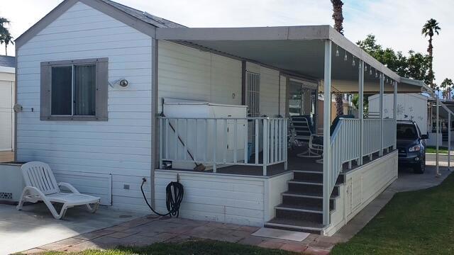 Located on the East Wall, Exceptional shape for its age. Easy rental unit when not in use. Wonderful Backyard for entertaining along with a covered deck. Refrigerator, Stove and Microwave included with unit. This is Turnkey and well appointed for Tenants.