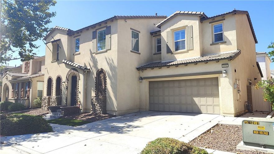 Extremely well maintained and highly upgraded 5 bed 3.5 Bathroom homes in a fairly new and well maintained community walking distance to a small community park and a larger community park. As you enter  the house with high ceiling is a den or office and a formal and then there is an open kitchen with upgraded black splash and is practically brand new because owner don't cook or use the appliances at all because they use the small kitchen that they made from the tandem 3rd garage. Formal dinning room is open to the kitchen and access to backyard. Large square family room with beautiful lights. Downstairs have a bedroom with its own full bathroom. Downstairs flooring is primarily upgraded italian tile that resembles wood. There is 3 car attached garage with tankless water heater and water softener. Upstairs is a large master bedroom with a large master bathroom and walk in closet. Upstairs also have a den/living room/office and 3 bedrooms sharing a full bathroom and good size laundry room. All bedrooms have high quality laminate wood flooring. Backyard is good size with california room and trellis for planting. 2 central AC/Heating unit to control upstairs and downstairs separately with Nest thermostat. Home has leased solar to help out with electricity cost. House is facing North and South so its is extremely good in weather, where summer time the house is naturally cooler and winter time is naturally warmer. House is not near electricity tower and in a quiet street location. Beautiful crystal hanging on the high ceiling on the stairs is included with sale. House has led and upgraded lightings throughout and ready for move in!