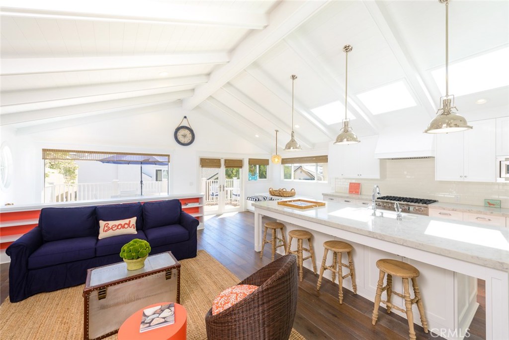 Great price for a dream home near downtown with a flexible floorplan. This fully remodeled beach cottage near downtown has old-time charm, but modern everything. Wide-plank oak flooring throughout, with an open concept living area upstairs and built-in dining nook. Sparkling white marble countertops highlight a stunning cook's kitchen, with high-quality cabinetry and thoughtful finishes throughout the home. There is so much more space here than expected, with 4 sizable bedrooms, separate upstairs and downstairs family rooms and a wet bar. Enjoy indoor/outdoor living with a top-level deck and a spacious, private enclosed backyard downstairs. It all comes together with extra style to spare. From this location, you are a short walk to downtown Manhattan Beach's many restaurants and other attractions. You can park 4 cars without relying on the street. UNFURNISHED rental. 12 MONTHS, not short term. PETS: Might be flexible re: pets, please inquire. ** Please note: Photos are from prior listing and may not reflect current status of interior or neighboring homes.