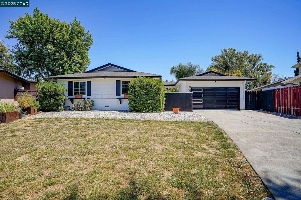 Tastefully updated single-story home on quiet Pleasant Hill court. 3 bedrooms, 2 full bathrooms, approx. 1,188 sq ft on 8,800 sq ft lot. Open-concept floor plan with updated flooring, recessed lighting, and remodeled kitchen featuring shaker cabinets, quartz counters, stainless steel appliances, and chevron tile backsplash. Primary bedroom includes remodeled en-suite bathroom. Additional bonus room ideal for office or flex space. Backyard features salt water pool, spa, patio, and low-maintenance landscaping. Detached garage and fresh exterior paint. Generous lot provides potential space for an ADU (Last photo is AI Rendering showing possibility) Convenient location close to shopping, dining, parks, and schools.