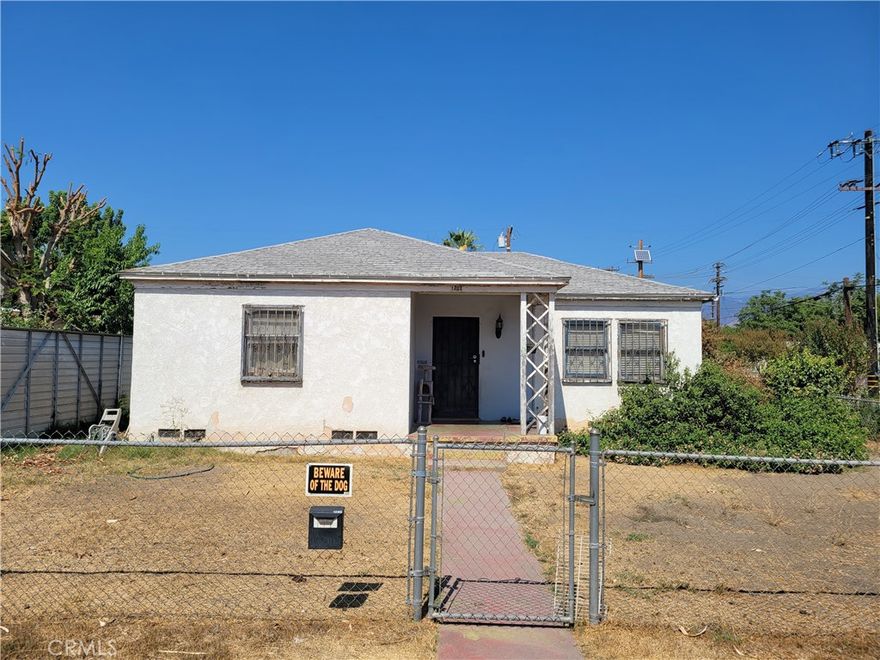 2bd 1bth home on a corner lot with lots of potential! Original oak flooring in living room and bedrooms. Partially remodeled bathroom. Detached one car garage is ideal to convert to an ADU. This property will not go FHA and will likely not go conventional. Cash or hard money will likely be the only option.