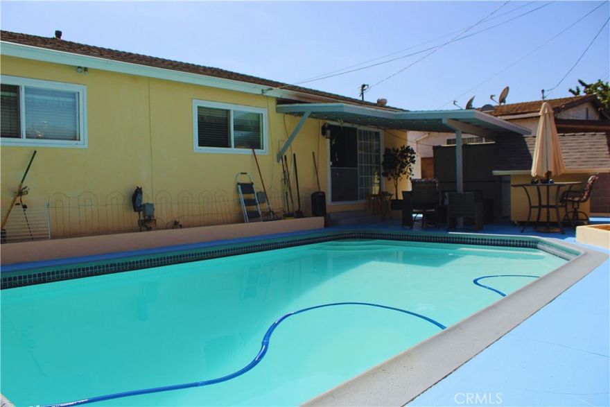 Pool Home Welcome to 835 E Bonds St in Carson—a move-in ready 4-bed, 2-bath home designed for easy living and effortless entertaining. Step inside to a bright, comfortable layout that flows from the living area to the kitchen and out to a spacious backyard. The real highlight is the private outdoor retreat: an inviting pool framed by a generous patio, perfect for weekend barbecues, evening gatherings, or relaxing by the water. A **separate two-car garage** offers secure parking, storage, or potential workshop space. With practical bedroom spacing, two well-appointed baths, and an indoor-to-outdoor transition that makes daily life feel seamless, this property blends comfort and convenience.