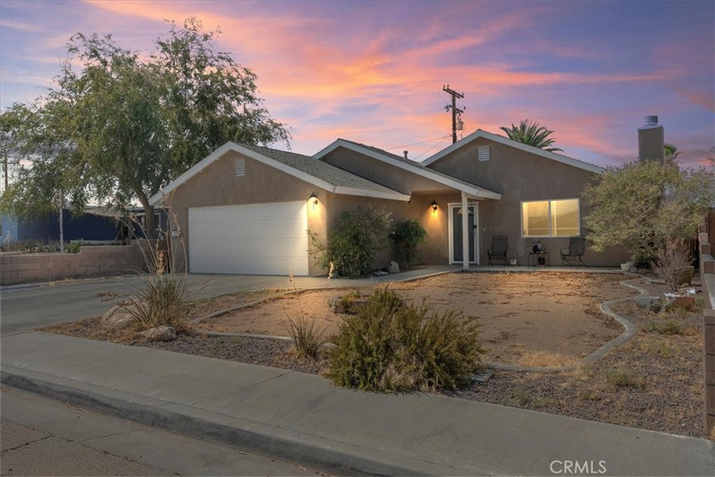 This move-in ready 3-bedroom, 2-bath home features an updated kitchen, wood-look tile flooring throughout, and fresh paint that creates a bright, inviting atmosphere. The open floor plan provides a comfortable flow for both everyday living and entertaining.
The spacious enclosed back patio is has been fully finished - complete with power - and converted into a versatile game room with epoxy floors. The garage also features matching epoxy flooring, adding to the home's clean, upgraded look.
Sprinklers are already in place for future landscaping, while energy efficiency is enhanced with a combination of owned and leased solar panels plus battery backup for added peace of mind.
Don't miss the chance to make this beautifully updated and energy-efficient home your own - schedule a showing today!