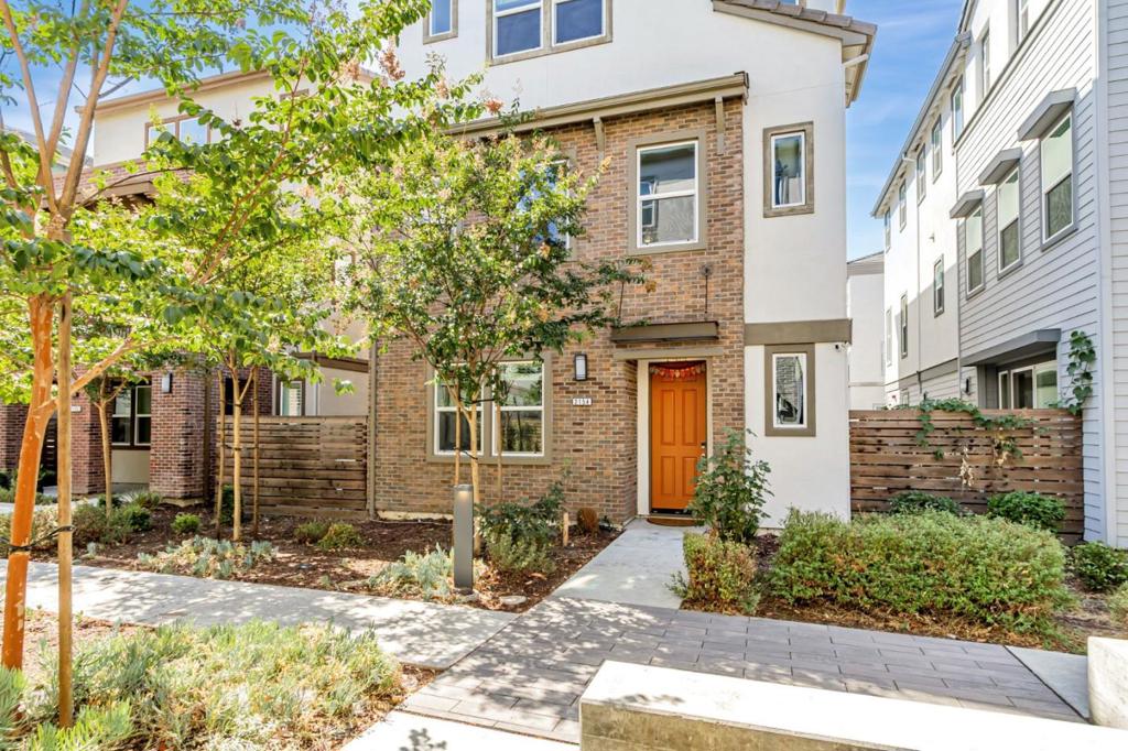 Built in 2019, this beautifully upgraded single-family home offers luxury living with over $70K in custom finishes and a modern layout. Nestled in the prestigious Asana community, this pristine home features 4 spacious bedrooms and 3.5 bathrooms including a convenient 1BR/1BA suite on the ground floor, ideal for extended family or potential rental income. Step into an open-concept main level where the gourmet kitchen takes center stage, featuring high-end Italian appliances, quartz countertops, upgraded cabinetry, and an oversized island, and is seamlessly connected to the dining and living areas - perfect for entertaining or everyday living. Soaring ceilings, premium flooring, and large double-pane windows flood the home with natural light and tranquil views, while abundant nearby street parking and a spacious garage add everyday convenience. The luxurious primary suite is your personal retreat with a massive walk-in closet and a spa-inspired ensuite bathroom featuring a soaking tub and upgraded walk-in shower. Outdoor spaces include a covered patio and a professionally designed side yard. Additional highlights include a fully owned solar system, EV charger, water softener, and generous storage. Community includes a clubhouse, playground, garden, walking paths.