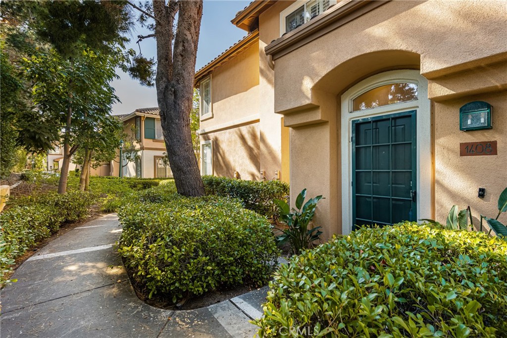 Welcome to Brio, a picturesque community in beautiful Westpark, in Irvine. A coveted upper level, end unit, this 2 bed 2 bath open floorplan is kept bright and beautiful with soaring ceilings and abundant natural light. Upgraded with dual pane windows and recessed lighting throughout and furnished with a full suite of stainless-steel appliances. Your upgraded kitchen features a stylish tile backsplash and upgraded countertops. Enjoy the legendary Orange County sunsets from your own private balcony, or retreat to the cozy fireplace and entertainment center. Boasting impressive storage space, and appointed with closet organization systems. A spacious master suite features a sizeable walk-in closet, dual vanities, and a shower tub combination. Enjoy a rare, full-size 2-car garage with laundry and direct access. Extensive Westpark amenities include 3 pools, spas, parks, playgrounds, sport courts and more. All this, nestled in the award-winning Irvine Unified School District. Only minutes away from prime shopping, dining and entertainment at the Irvine Spectrum Center, Fashion Island, and South Coast Plaza. Enjoy all the best Orange County has to offer.