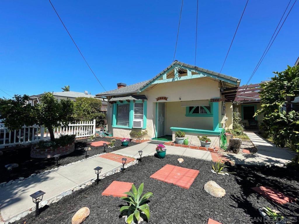 Charming 1 bed, 1 bath house with spacious living room, large kitchen counter space, and front porch. Features 2 AC units for optimal comfort. Enjoy privacy with a fenced yard and shared common area. Convenient street parking available.