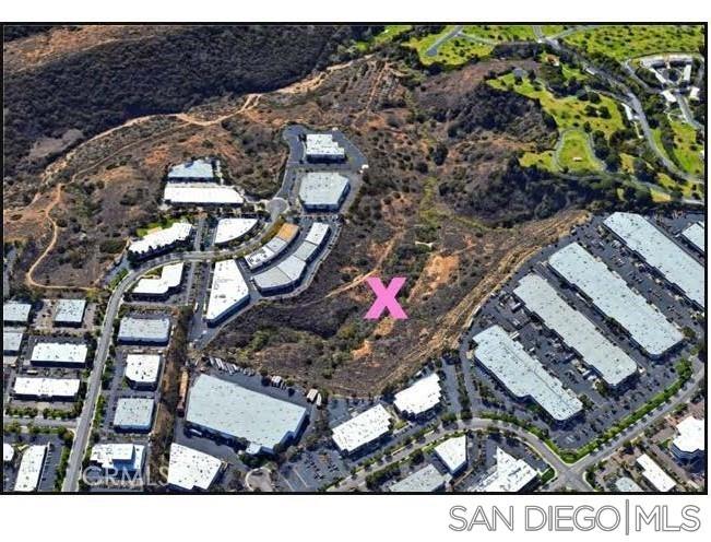 Land for sale in central San Diego, 19+ acre lot Mira Mesa on Mesa Rim Rd. $249,900. Beautiful Canyon lot along industrial buildings. Zoned light industrial however there is a conservation easement on the land. Call the City of San Diego planning department for details, give them APN #341-362-23-00 and ask for any information they can give as far as use permits and what can be done with the land. Views and nature trails with plenty of open space, wild flowers and more. Possibly used for mitigated property for developers in the area to off set developing other land, call City to find out if it can be used for mitigated property. Some vehicles are parked on the land call agent to gain access prior to showing. Land for sale in central San Diego, 19+ acre lot Mira Mesa on Mesa Rim Rd. $249,900. Beautiful Canyon lot along industrial buildings. Zoned light industrial however there is a conservation easement on the land. Call the City of San Diego planning department for details, give them APN #341-362-23-00 and ask for any information they can give as far as use permits and what can be done with the land. Views and nature trails with plenty of open space, wild flowers and more. Possibly used for mitigated property for developers in the area to off set developing other land, call City to find out if it can be used for mitigated property. Some vehicles are parked on the land call agent to gain access prior to showing.