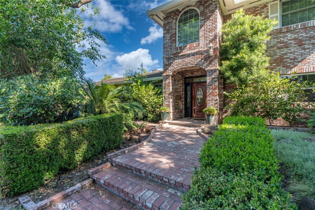 GORGEOUS CORNER LOT LARGE 2 STORY HOME IN LAKEWOOD COMMUNITY WITH A POOL AND POSSIBLE 7 BEDROOMS! This STUNNING home provides generous space on nearly a quarter acre, with the option of having 2 ADUs with separate entrances, with a climate-controlled 4-car garage and RV parking if desired. This is truly the Home that checks all the Boxes with Prime Location in one of the NICEST neighborhoods in Modesto, near Award Winning Schools and Shopping centers. Due to family circumstances, it will only be available on the Market ONE time at a spectacular price! This House was made into a Forever Home by the growing family and everything was done with Love, and hoping it Sells to a nice family that could Love it and Take care of it just as the sellers did. As you walk around the corner lot Estate, it just seems to never end. From the front Door Elegance Surrounded with Real Brick, to sleek wood flooring throughout, it features 4 bedrooms (POSSIBLE 7) brand new carpet, a skylight within a LARGE Master Shower, 2 Large Master Suites, an EXTRA LARGE laundry room, Formal Living Room, Family Room, Formal Dining Room with a cozy Fireplace and a Breakfast Nook. There's a built in Pool, an outside Bar with sink, Lemon Trees and a Courtyard for cars or entertaining with a Home Movie Theater!