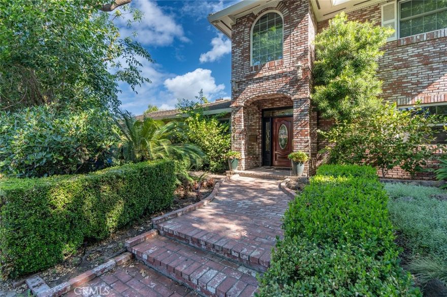 GORGEOUS CORNER LOT LARGE 2 STORY HOME IN LAKEWOOD COMMUNITY WITH A POOL AND POSSIBLE 7 BEDROOMS! This STUNNING home provides generous space on nearly a quarter acre, with the option of having 2 ADUs with separate entrances, with a climate-controlled 4-car garage and RV parking if desired. This is truly the Home that checks all the Boxes with Prime Location in one of the NICEST neighborhoods in Modesto, near Award Winning Schools and Shopping centers. Due to family circumstances, it will only be available on the Market ONE time at a spectacular price! This House was made into a Forever Home by the growing family and everything was done with Love, and hoping it Sells to a nice family that could Love it and Take care of it just as the sellers did. As you walk around the corner lot Estate, it just seems to never end. From the front Door Elegance Surrounded with Real Brick, to sleek wood flooring throughout, it features 4 bedrooms (POSSIBLE 7) brand new carpet, a skylight within a LARGE Master Shower, 2 Large Master Suites, an EXTRA LARGE laundry room, Formal Living Room, Family Room, Formal Dining Room with a cozy Fireplace and a Breakfast Nook. There's a built in Pool, an outside Bar with sink, Lemon Trees and a Courtyard for cars or entertaining with a Home Movie Theater!