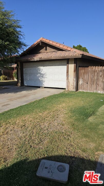 Wonderful opportunity in a central area of Indio! This single family residence features 3 bedrooms, 2 bathrooms, attached 2-car garage (without direct access), and a spacious backyard on an over-6000 square foot lot. The property is well located in a residential neighborhood, close to schools, shopping, dining, and amenities, as well as the Coachella and Stagecoach Festivals and all that the desert has to offer. The price reflects the current condition of the property, which was tenant occupied for many years and likely requires significant repairs/ remediation and improvements; the property is being sold "as is". Note: tax records show 2BR/2BA and 1032sqft, but the property has 3 bedrooms and 2 full bathrooms and has been taped by a vendor to be around 1280-1400sqft. Buyers should personally and professionally investigate the property and verify all information regarding the property. Great potential for motivated buyers and investors. Don't miss this opportunity!