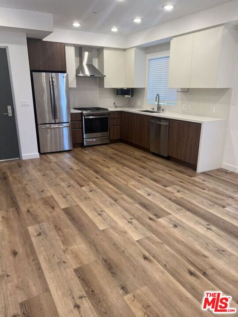 Photo of 1143 Glenville Drive #101, Los Angeles, CA 90035 (MLS # 25631393)