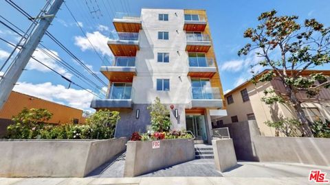 Photo of 1143 Glenville Drive #101, Los Angeles, CA 90035 (MLS # 25631393)