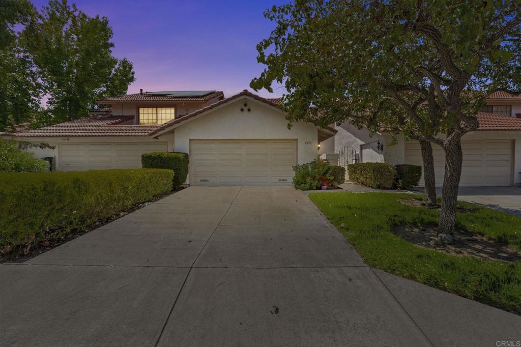 Welcome to this beautifully maintained 3-bedroom, 2.5-bathroom condo nestled in one of Carlsbad’s most desirable communities. With 1,717 square feet of well-designed living space, this home offers an ideal layout for both relaxation and entertaining. Enjoy the warmth of a cozy gas fireplace in the living area, and step outside to your private back patio for a peaceful outdoor retreat. Hardwood flooring flows throughout the main level, while the upstairs features soft carpet for added comfort. The home is equipped with leased solar, helping you save on energy costs. Situated in an exceptionally well-kept community, residents enjoy access to two sparkling pools, a tennis court, and beautifully maintained grounds. The HOA covers roofs, water, and all common areas, providing added value and convenience. Located just minutes from top-rated schools, shopping, dining, and Carlsbad’s world-famous beaches, this home combines comfort, quality, and an unbeatable lifestyle. Don’t miss the opportunity to own a turnkey home in a truly fantastic location!
