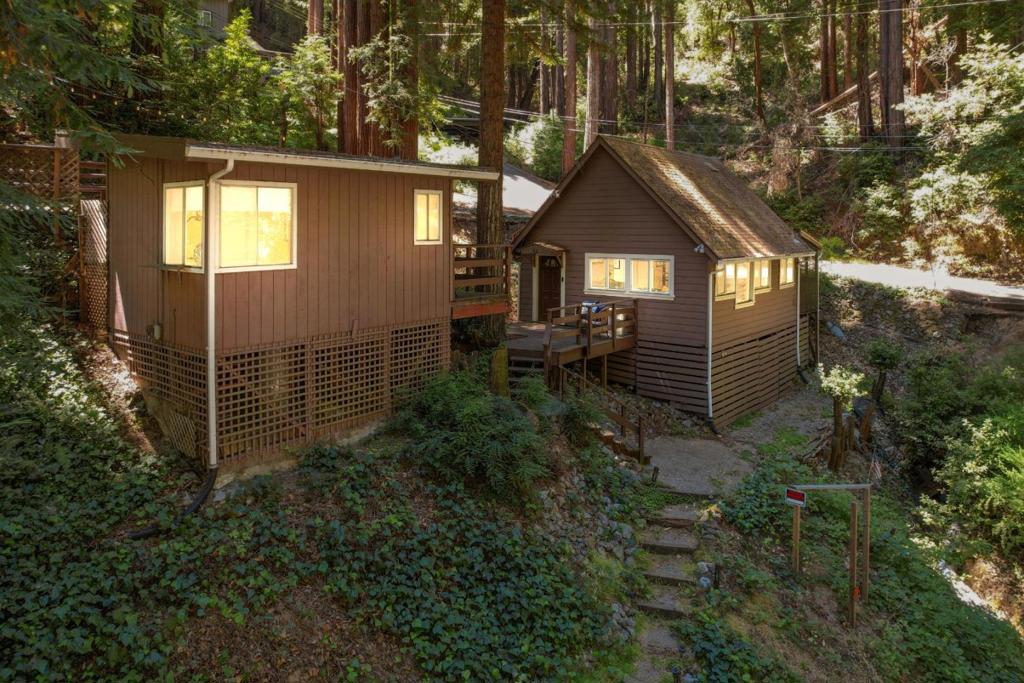 This charming 2-bedroom cottage & separate guest house is nestled in the desirable Forest Springs neighborhood. Imagine this: you wake up surrounded by nature, step out onto the large redwood deck to take in the fresh air & admire the stunning views. Sunlight filters its way through majestic redwood trees, & dew glistens off the trillium that has just begun to bloom. You are home. The main house has been updated w/ stainless steel kitchen appliances & a gas fireplace. There is plenty of parking above & below the house, making it easy to accommodate guests. Go for a round at Boulder Creek Golf Course just up the road. If you are looking for a place to truly escape from it all, look no further than Forest Springs. Minutes to downtown boulder creek & a quick jaunt over the hill to Saratoga, redwood city & more!
