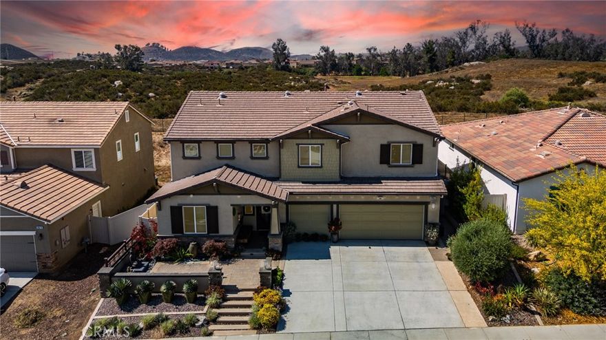Gorgeous Murrieta 5 Bedroom Home with private yard backing to Open Space for Serene Views and PRIVACY, No neighbor behind home! Location, Location, Location! No HOA, Owned Solar, This Exceptional Home has lots of natural lighting and has been Professionally Landscaped and Features a Formal Entry, 5 Large Bedrooms, Main Floor Den/Office (possible 6th bedroom), Large Loft (possible 7th bedroom), plus Expansive Great Room with Spacious Living Room, Kitchen, Dining Area and Luxury Vinyl Plank Flooring Throughout the entire house! There is a Large Downstairs Bedroom and Full Bathroom. The Kitchen includes Upgraded Cabinets, Granite Counters, Custom Tile Back Splash, Stainless Steel Appliances, the Impressive Island includes a Stainless Steel Sink, Water Filtration System, Dishwasher, Custom Lighting and lots of Seating. The Walk in Pantry has Custom Built-ins for all your storage needs. The Luxurious Master Bedroom has a Large En Suite Bathroom with Large Soaking Tub, Walk in Shower, Double vanity, Walk in Closet with Custom Built-in Organizers. All additional Guest Rooms are Very Large and have Custom Built-in Closet Organizers and All bathrooms have Upgraded Tile and Cabinets. The Cozy Loft is an added bonus and could be a 7th bedroom! The Great Room and Dining Room have 3 Sets of French Doors that lead out to the "Private " Back Yard that has been Professionally Landscaped with a Large Custom Patio, Insulated Aluminum Patio Cover, Remote Controlled Sun Shades, Custom Pavers, Custom Lighting, Fountains, Vibrant flowers, Plants, Trees. This Serene Yard is very Private, backs up to a Nature Preserve and is Perfect for Entertaining! The 3 Car Garage has a Utility Sink, Tankless Water Heater and Plenty of Room for Storage! The Owned Solar will provide Energy Cost Savings! This Amazing home is located near Alderwood Public Park with Playgrounds, Large Enclosed Dog Park, Pickle ball, Basketball Courts and Picnic Tables!! Its close to Schools, Shopping, Wineries, Costco, Loma Linda University Medical Center , Kaiser Permanent and the 215 & 15 freeways for an Easy Commute. Welcome Home!