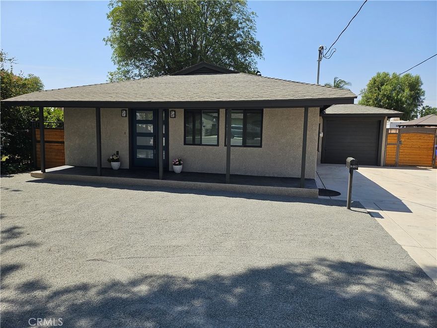 Discover this charming Riverside home, meticulously renovated from top to bottom to offer a like-new living experience with classic appeal. This turnkey property presents an exceptional opportunity for first-time buyers, retirees, and investors alike. Situated on a spacious 0.34-acre flag lot with convenient street access on both ends, it's perfectly set up for adding an ADU with its own private entrance or for designing your ultimate backyard oasis. You'll also appreciate the RV access with hookups and the expansive two-car tandem garage, providing ample space for vehicles, tools, and toys. Its prime location offers easy walks to shopping and parks and quick access to freeways.
