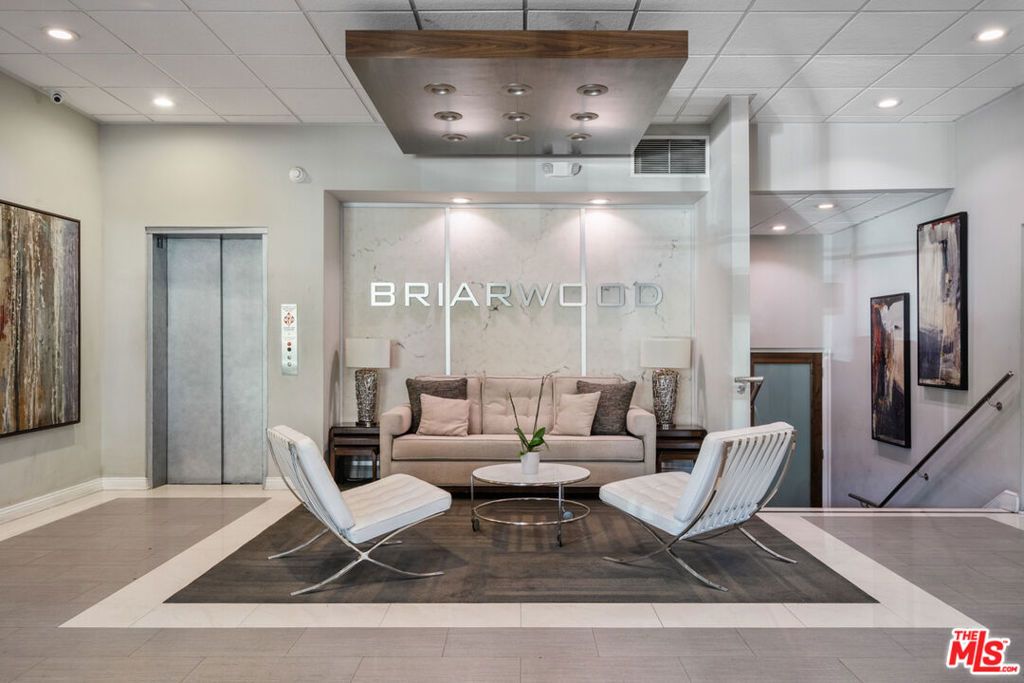 Photo of 1745 Camino Palmero Street #104, Los Angeles, CA 90046 (MLS # 25618233)