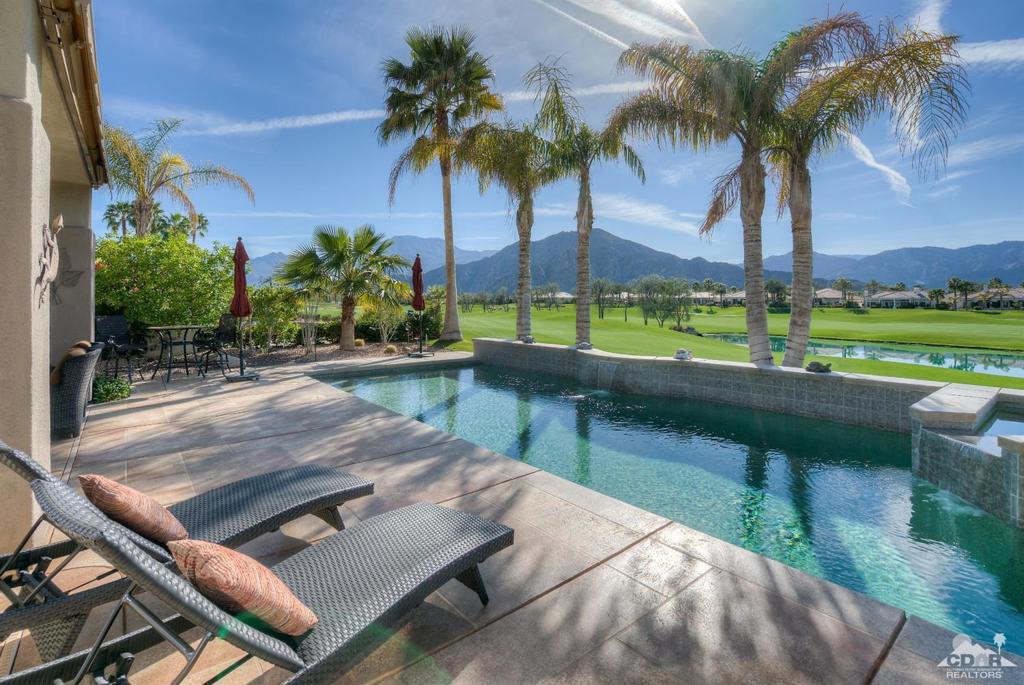 Highly upgraded. This Belize's private courtyard leads into an impressive rotunda foyer with entrances to the Great Room, private office/media and the bedroom wings. Two big master suites plus a courtyard casita. A bonus retreat off the Great Room offers relaxing views across the pool and the course to the mountains. Dramatic twelve-foot soffited ceilings, 8' interior doors, 8' patio doors, gourmet kitchen, slab granite counters, convection oven and built-in refrigerator; switch-start fireplace, Jacuzzi whirlpool tub and separate shower in master bath, recirculating hot water, covered patio, security system with smoke, fire, & motion sensors. Cable, internet, and phone service with U.S. and Canada long distance is included. World-class amenities include a magnificent Clubhouse, a state-of-the-art Fitness center, a relaxing Day Spa, lighted tennis courts, pickleball courts and a resort-style pool.