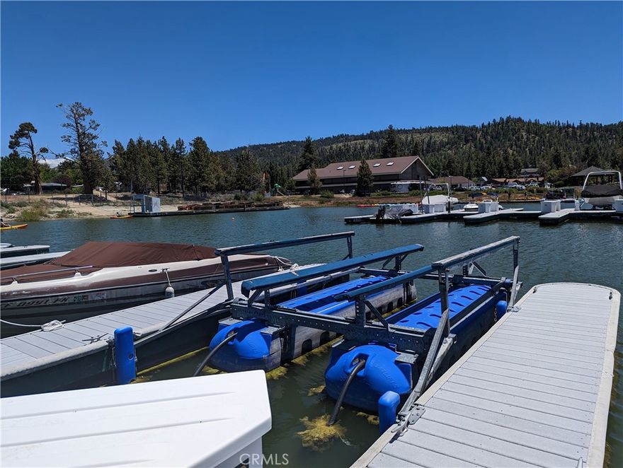 Turn yourself into a lake access owner with a fee-simple dock, AKA Dockominium, at the Pine Knot Dock Club, the only one of its kind on Big Bear Lake. Dock Club members enjoy parking passes, private restrooms, private entrance for after hours on the lake, dockside electric, video surveillance, nearly a ringside location to watch the fireworks AND this dock includes a HYDROLIFT to raise your boat while not using it. This location is very convenient to the fueling dock. There is also on-site management, a concierge, and a Marine center along with several other concessions. The dock will accommodate a 22-foot boat.