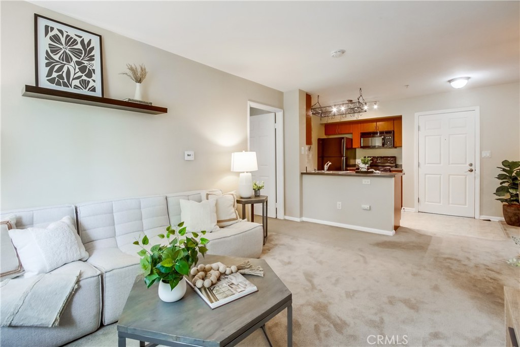 Superb 4th floor 2 bedroom, 2 bath home in the desirable Portico building ideally located in the heart of vibrant Little Italy ranked as a highly walkable neighborhood offering numerous diverse shopping, dining, and music venues, quaint piazzas, and Mercato Farmer’s Market. Within walking distance of train and trolley stations, the Ferry to Coronado, the Gaslamp Quarter, The Fish Market, Bankers Hill, Marina, Convention Center, Seaport Village, Balboa Park, and more! The light filled open floor plan includes a spacious living area open to both the kitchen and dining area, perfect for relaxing and entertaining. The kitchen boasts matching appliances and sleek cabinetry. The primary bedroom suite has a sunny sitting area, built-in closet organizers, and a spacious private bath with soaking tub. A spacious secondary bedroom and a full guest bathroom with a laundry closet and stackable washer and dryer unit completes this well-designed floorplan. 1 Car assigned parking space #18 in the community underground garage included with this home. Building amenities include lounging areas and workstations in the lobby and a community outdoor patio with gathering areas and a community BBQ. Superb opportunity to take advantage of modern and convenient urban living in a dynamic environment with easy access to San Diego Bay, Coronado, Waterfront and local beaches, Petco Park home of the Padres, world class museums, and iconic Balboa Park, San Diego Zoo, Japanese Gardens and more!