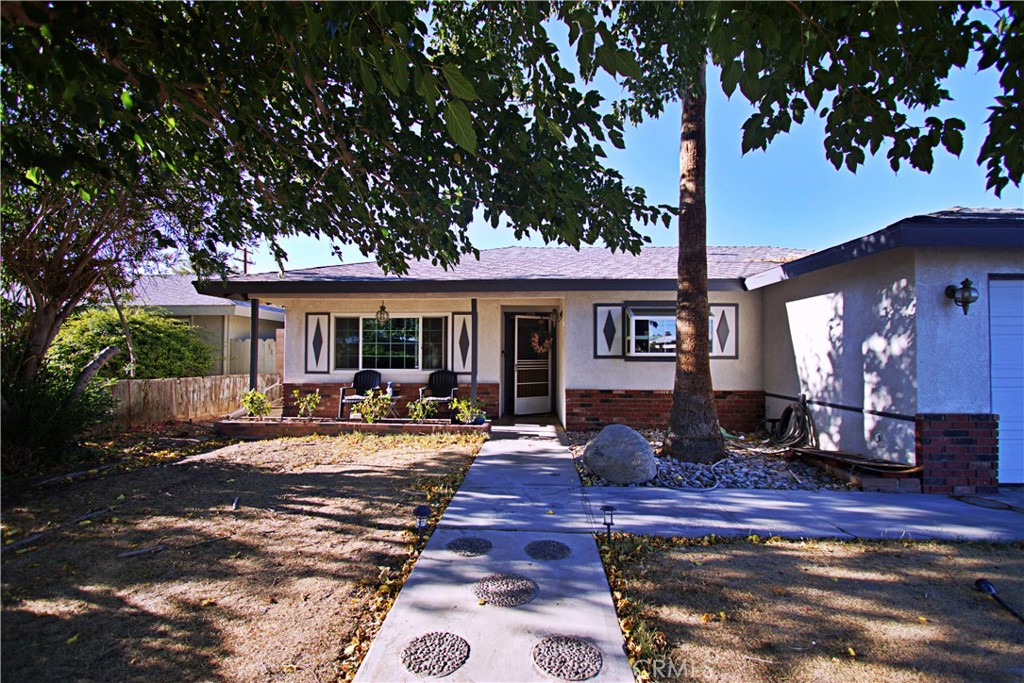 Welcome to 428 Perdew Avenue, a charming single-story home nestled in a quiet, established neighborhood in Ridgecrest, California. This spacious 4-bedroom, 2-bath residence offers 1,739 square feet of living space on an oversized 8,276 square foot lot, perfect for families or anyone seeking room to relax and entertain. Step inside to find a bright and functional layout featuring a cozy living room with a fireplace, large windows that fill the home with natural light, and a central evaporative cooling system designed to keep things comfortable during Ridgecrest’s warm desert summers.
One of the standout features of this home is the private backyard oasis, complete with a refreshing in-ground pool—ideal for cooling off, hosting BBQs, or enjoying tranquil evenings under the stars. The outdoor space also includes mature landscaping and an attached garage offering both parking and storage. Inside, the four bedrooms provide flexibility for growing families, guests, or work-from-home needs, while two well-appointed bathrooms offer both privacy and convenience.
Located in the desirable Sierra Sands Unified School District, this property is close to local schools, parks, and just minutes from the China Lake Naval Air Weapons Station, making it an excellent choice for military personnel or contractors. Ridgecrest also offers access to outdoor adventures like the Trona Pinnacles, Red Rock Canyon, and the Maturango Museum, blending small-town living with cultural and recreational activities. Whether you're looking for your forever home or a savvy investment, 428 Perdew Ave combines comfort, location, and value in one of Ridgecrest’s most inviting communities.