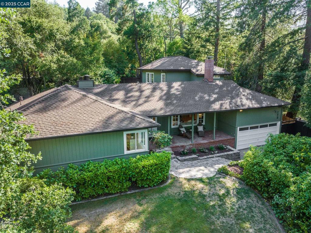 Private Orinda jewel in a gem of a location. Tucked away but close to downtown Orinda and top-rated schools this home is newly updated and ready to enjoy. It features a kitchen and primary bath remodeled in spring, 2025, refinished hardwood floors and a potential au pair unit. There are 4 bedrooms and an office and 3 baths. The thoughtfully remodeled kitchen has white cabinets, quartz counters, butcher-block island, Viking range, reverse osmosis water filter and wine fridge. There is a dining/living room with fireplace and an oversized family room beyond. Three bedrooms plus an office and bonus space are on the main level, with the spacious primary with vaulted ceiling and abundant natural light upstairs. The recently updated primary bath has a soaking tub, large shower, and double vanity. Surrounded by lush, mature plantings, the outdoor space is perfect for taking advantage of the summer weather. There is a level front yard, charming front porch and backyard with patio, deck and flat grassy area. Other features include a two-car attached garage, paver driveway, recessed lights and fresh carpet and paint. Take advantage of the best Orinda has to offer. The convenience of easy access to school and shops, with a great commute location and part of an established neighborhood.